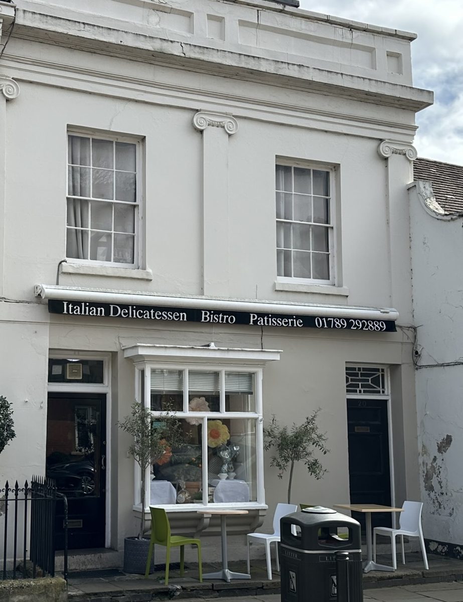 The white building on Church Street with the Italian Delicatessen, Bistro, Patisserie awning
