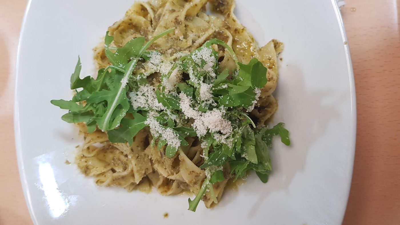 Tagliatelle with rocket and grated cheese